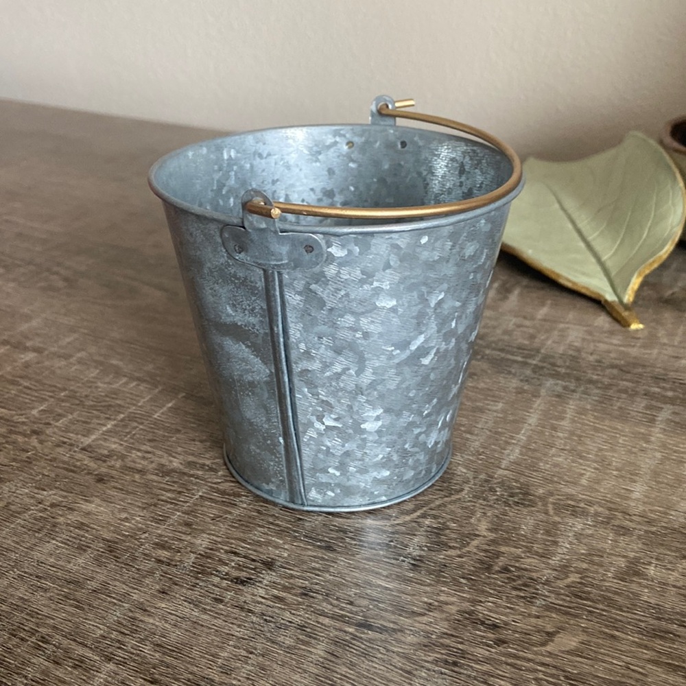 Small metal bucket